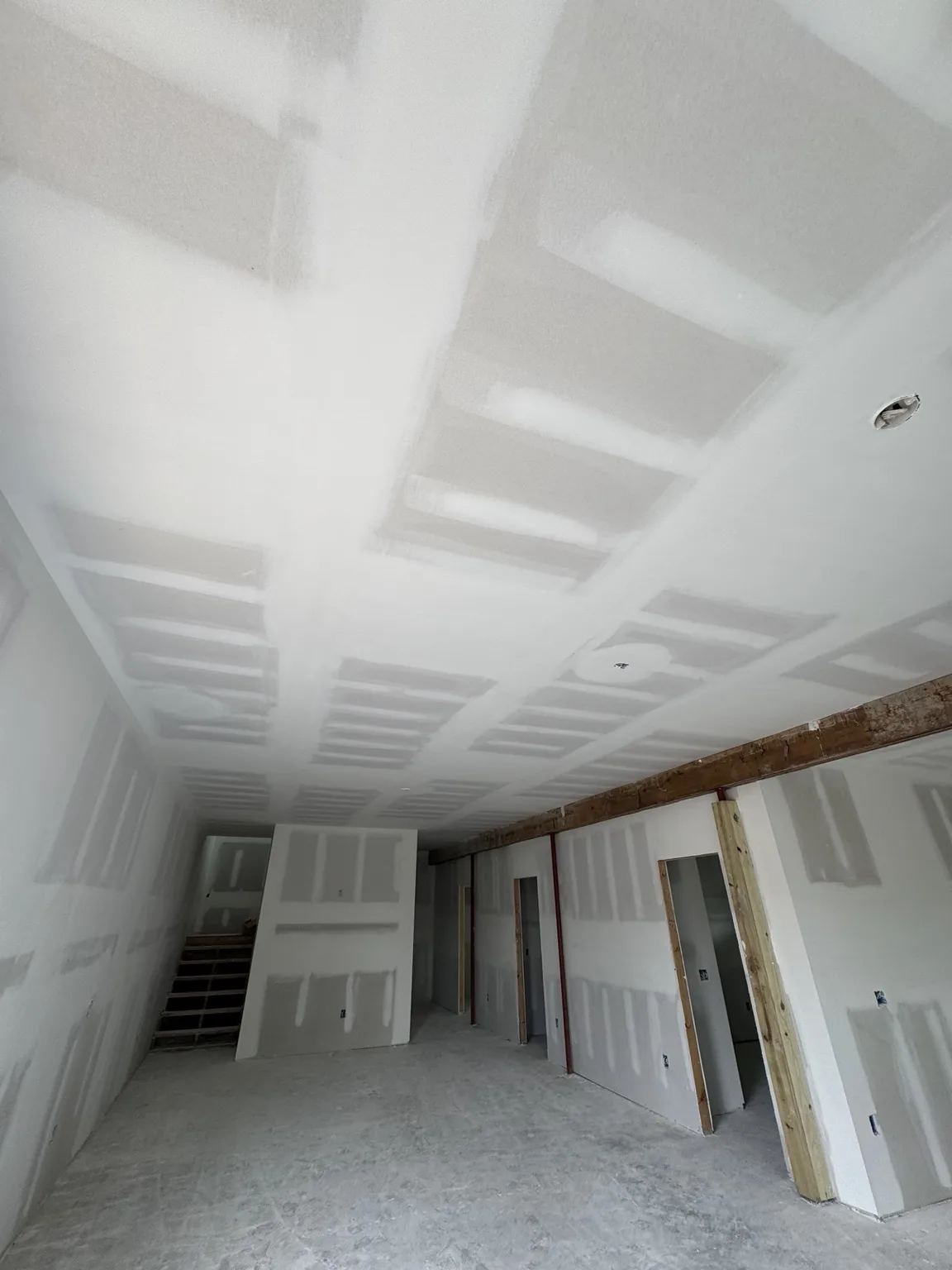Ceiling seams and fasteners during drywall finishing